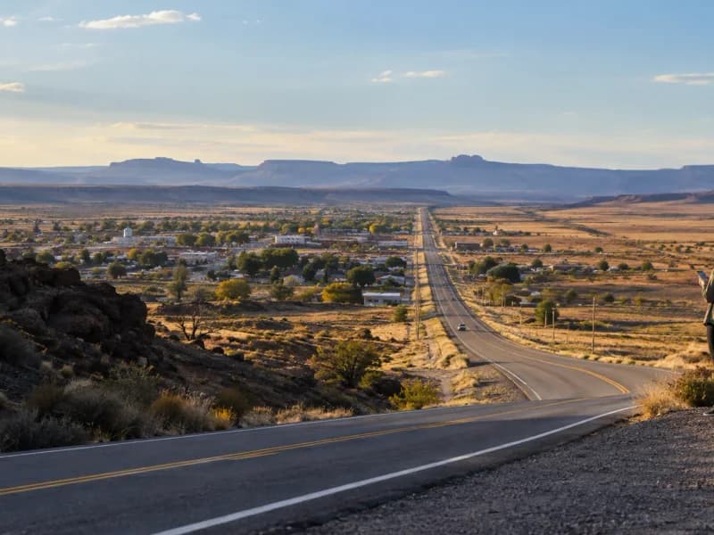 Road leading from a small American town into open high-desert country